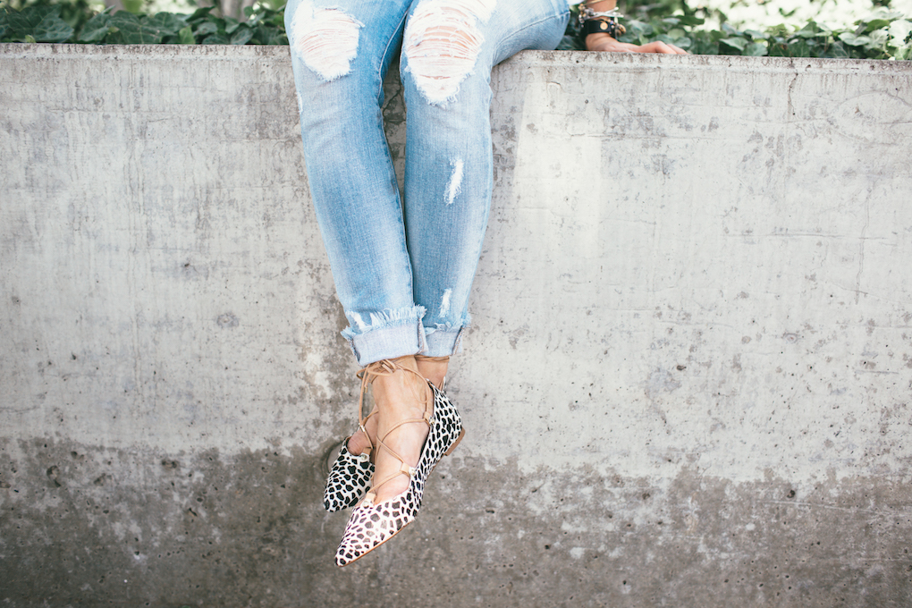 Distressed denim with fringe on the bottom with lace up leopard flats