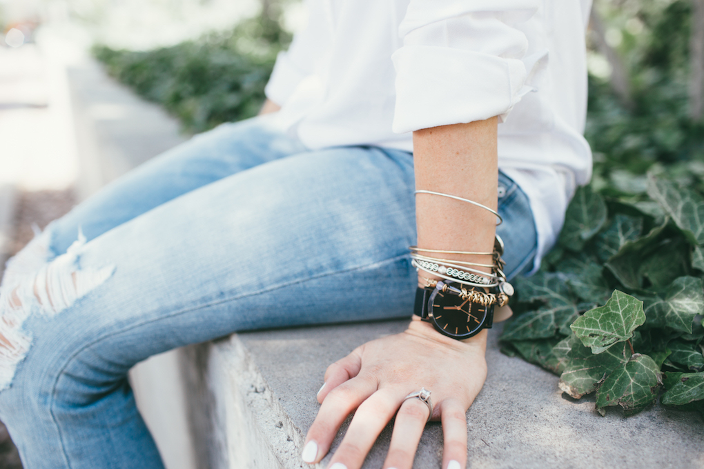 Clause watch with Alex and ani bracelets paired with white button up and distressed denim