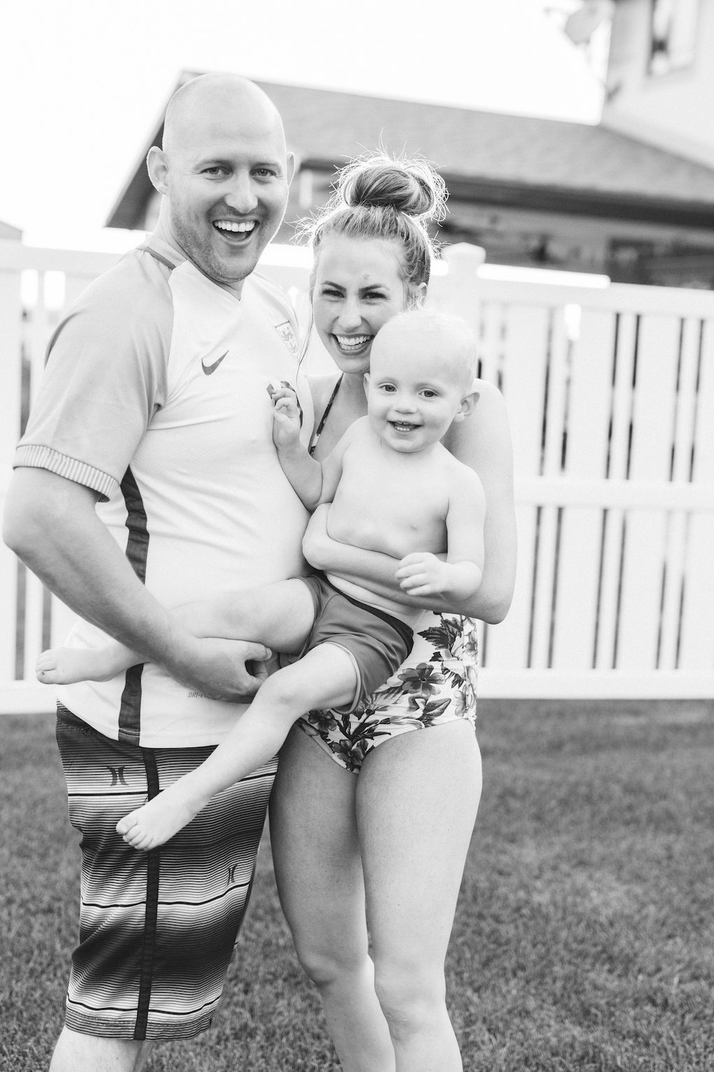 KINGS HAPPY UN-BIRTHDAY - KIDS BALL PARTY by Utah blogger Dani Marie - Mom with top knot with dad and little boy swimming