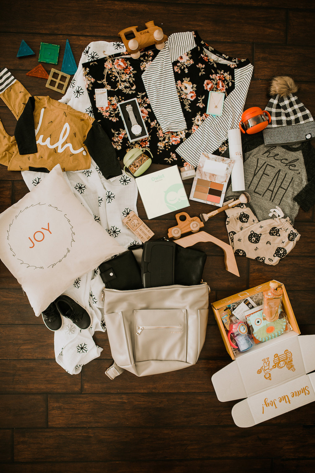 the ultimate holiday gift guide with products for mom littles and dad