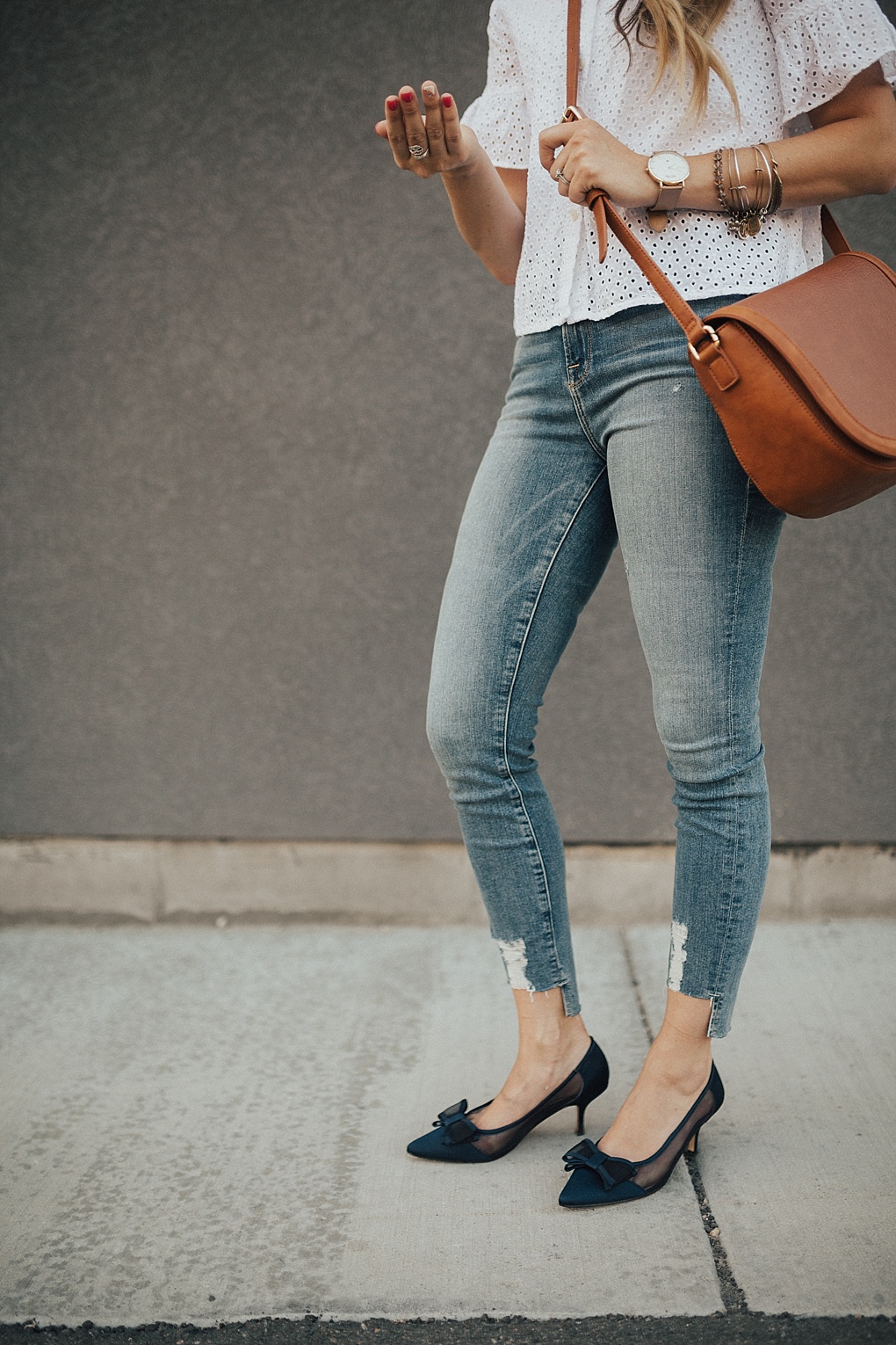 A Cute Eyelet Top To Dress Your Jeans Up by Utah fashion blogger Dani Marie