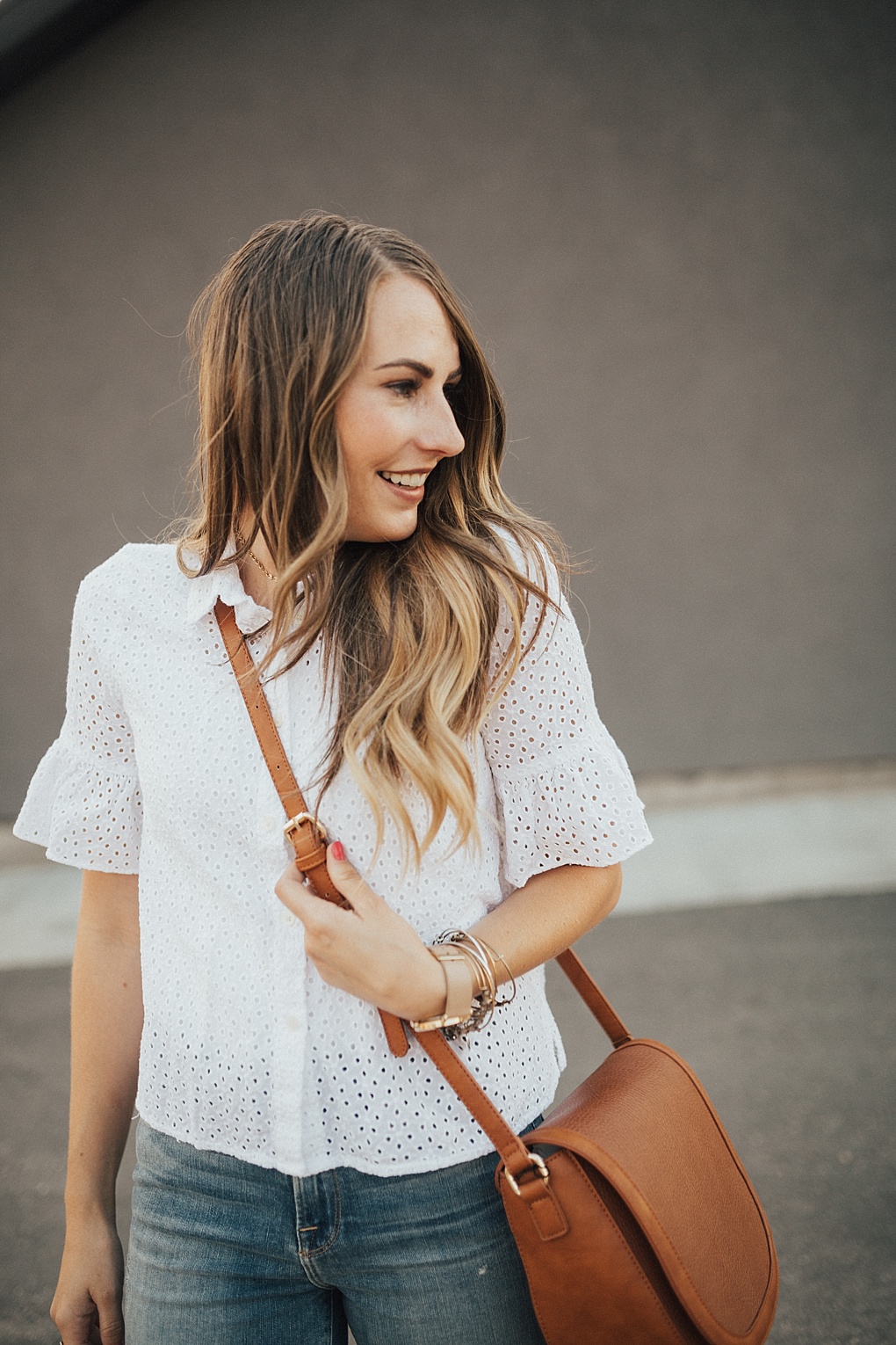 A Cute Eyelet Top To Dress Your Jeans Up by Utah fashion blogger Dani Marie