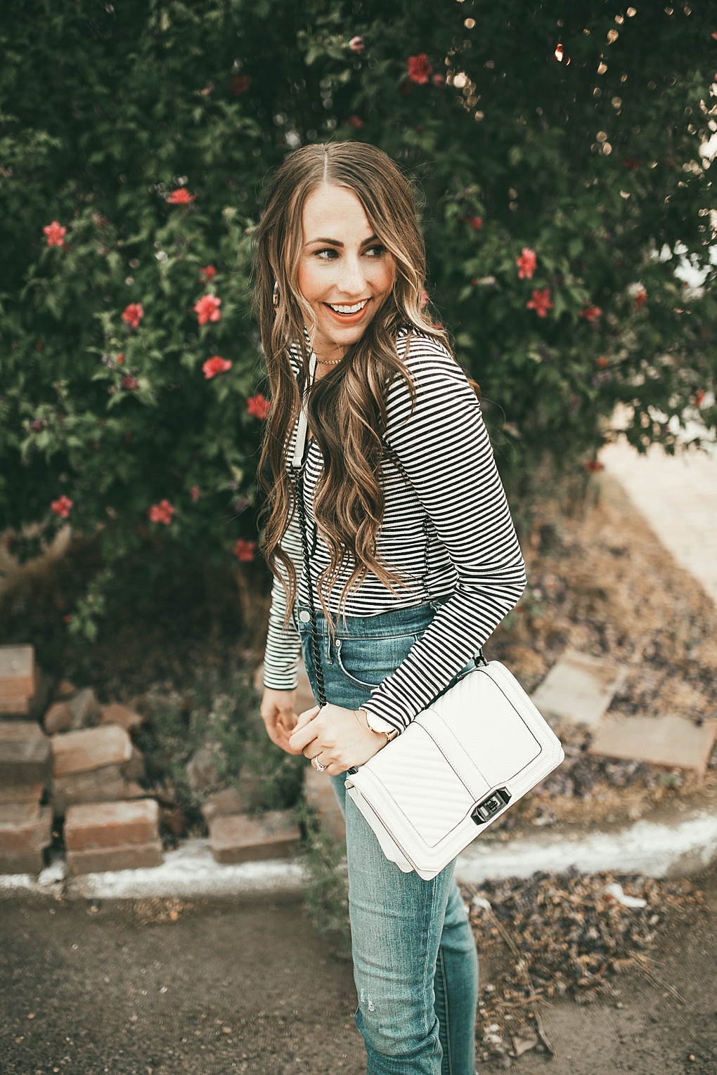 Curious how to style a henley like a pro? Utah Style Blogger Dani Marie is sharing her top tips with these 2 EASY ways to style a henley. 